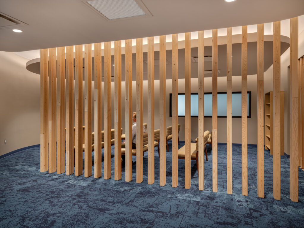 person sitting in interfaith room
