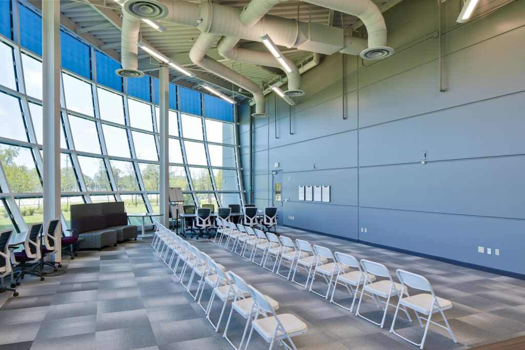 chairs set up in room for lecture