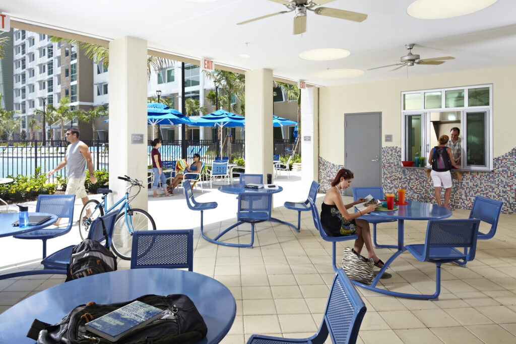outdoor seating next to pool