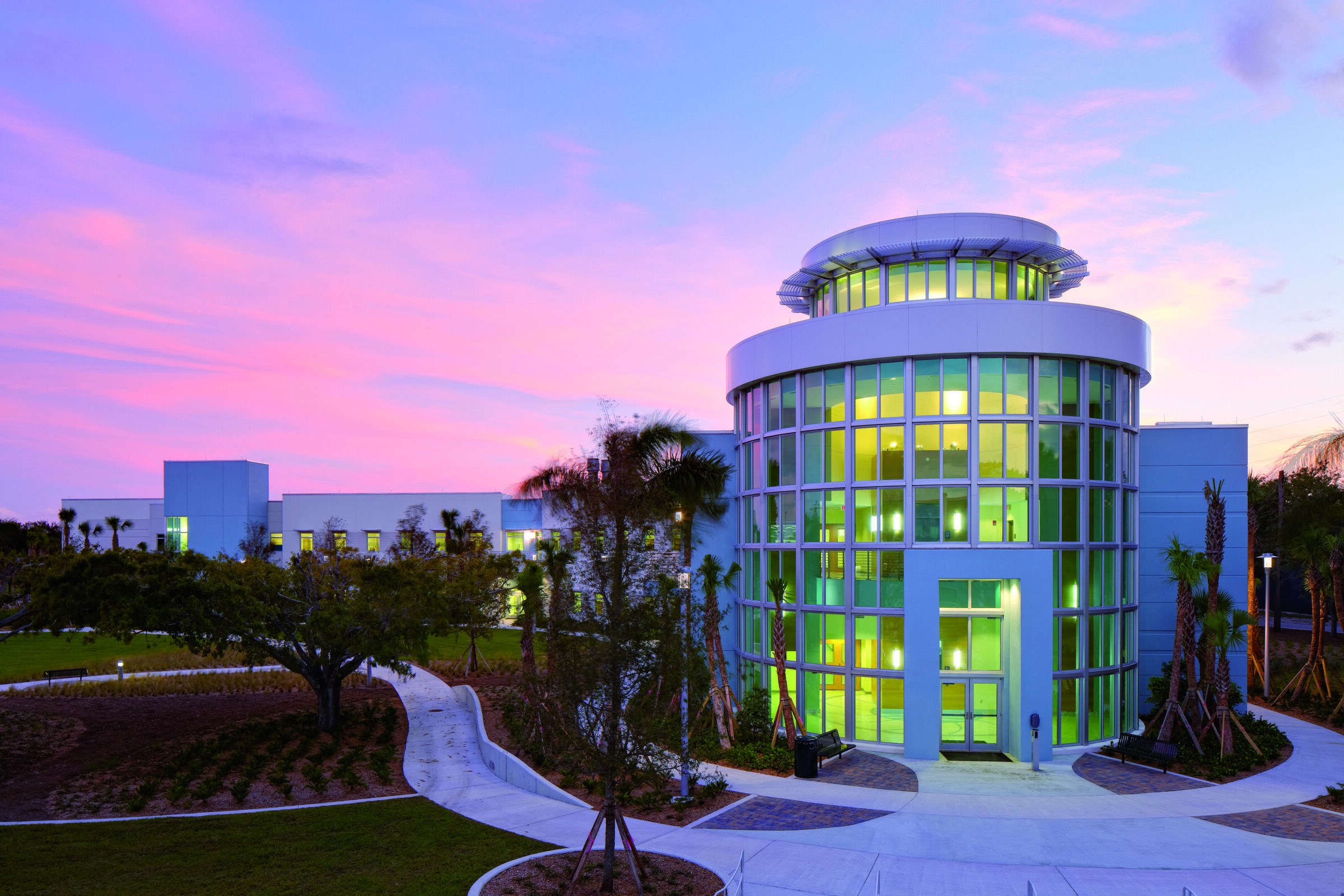 three-story, glass-enclosed lobby