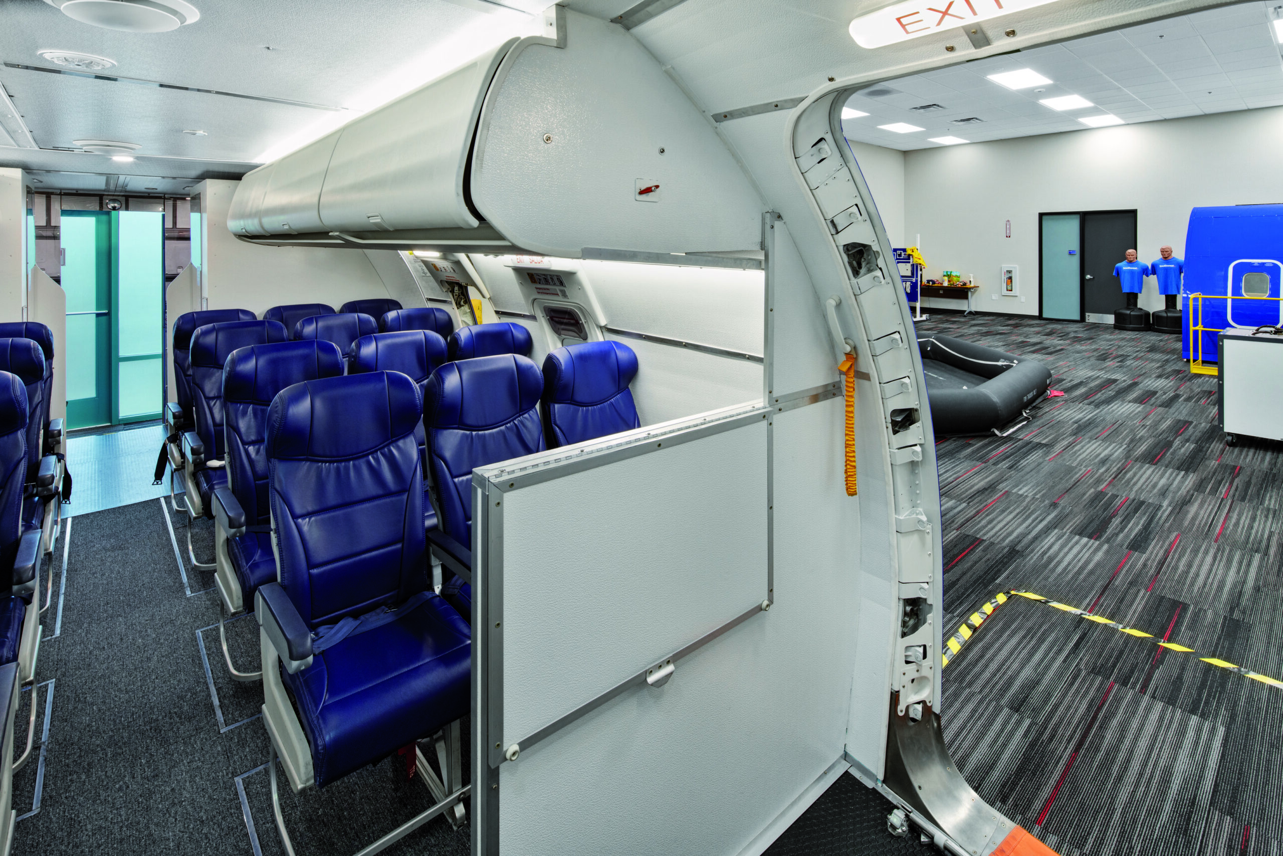 life raft and partial aircraft in training facility