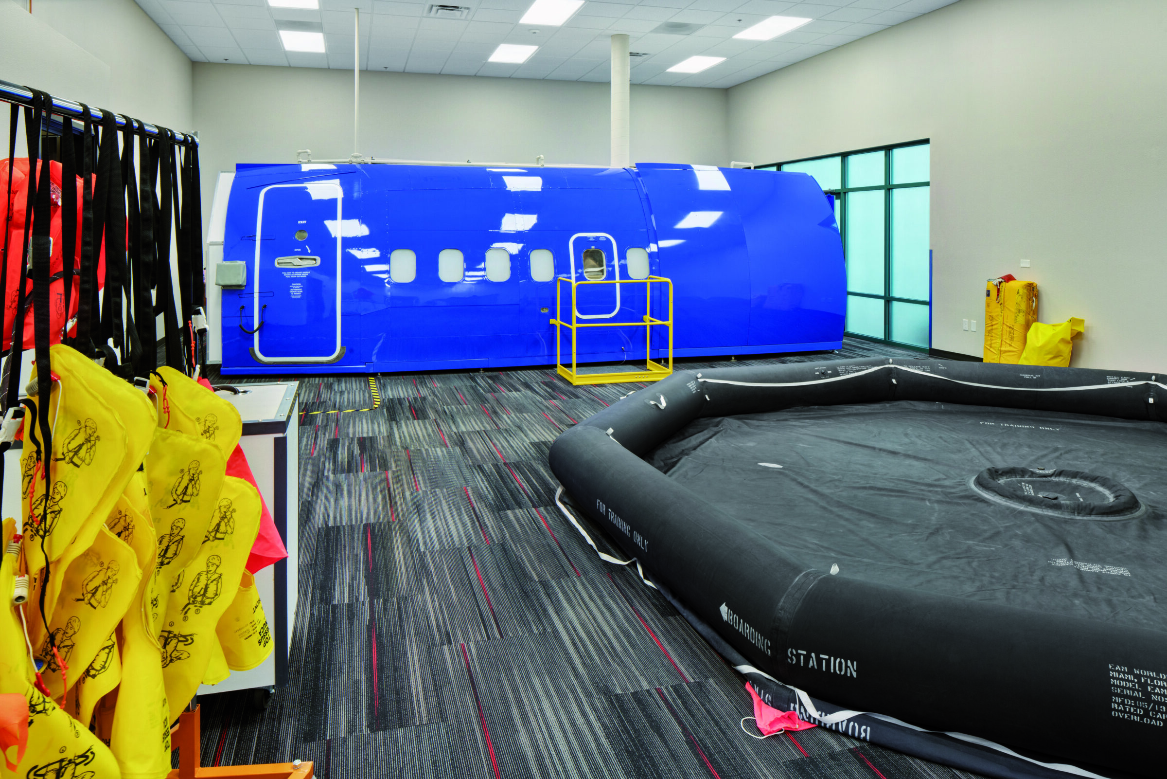 life raft and partial aircraft in training facility