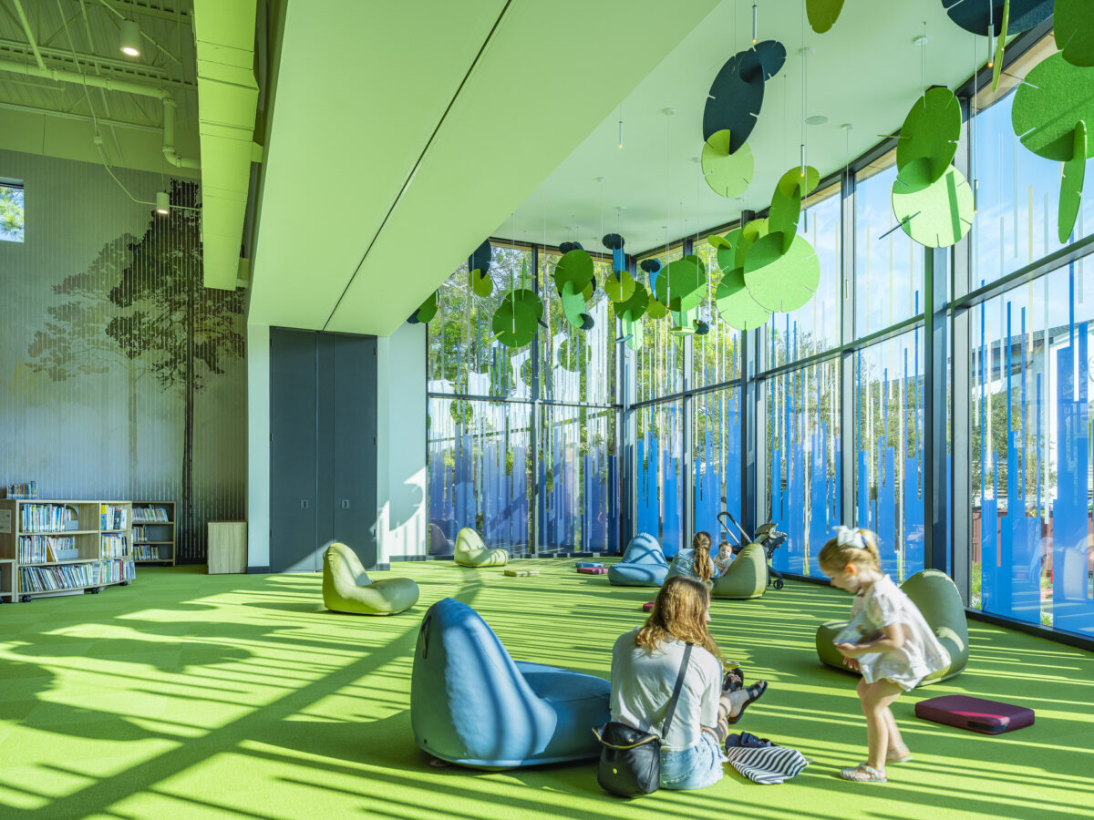 Main children's reading area in green and blue