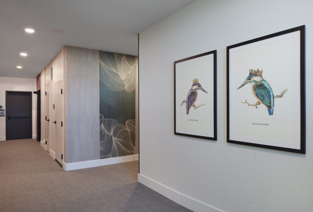 hallway with art on walls