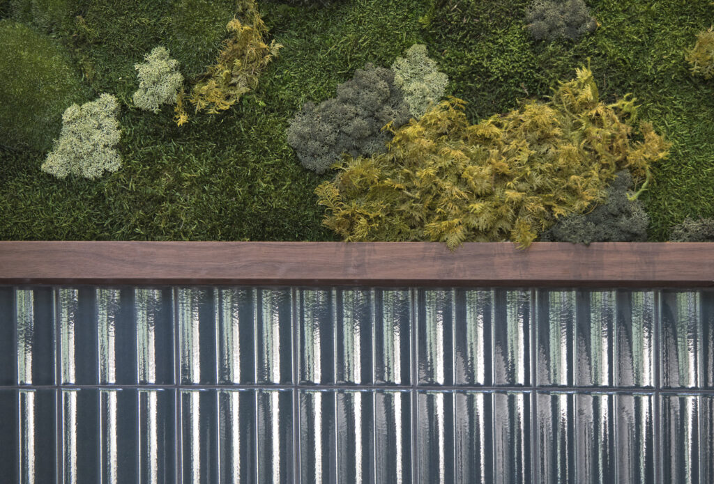 wall with metal and moss